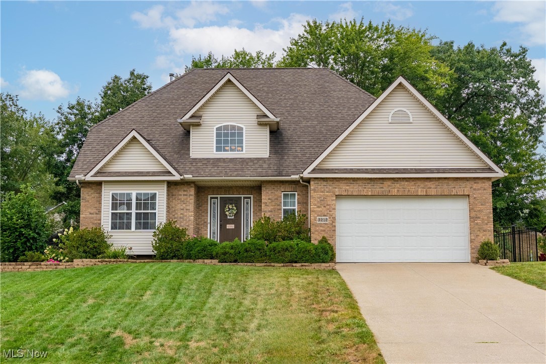 Welcome to this stunning two-story home located in the highly sought-after Mystic Pointe neighborhood within Green Local Schools. The inviting two-story foyer greets you upon entry, opening to a front sitting room and formal dining room. The heart of the home is the open-concept eat-in kitchen, complete with a walk-in pantry, that flows seamlessly into the spacious great room—perfect for everyday living and entertaining. A convenient half bath and first-floor laundry complete the main level. Upstairs, you’ll find four generously sized bedrooms, including a relaxing primary suite designed for comfort and privacy. The lower level remains unfinished, providing endless opportunities to create the space you’ve always envisioned. Step outside to a fully fenced backyard featuring multiple areas for entertaining, whether you’re hosting cookouts, gathering with friends, or simply enjoying a quiet evening at home. Combining space, style, and an unbeatable location, this home is truly a must-see!