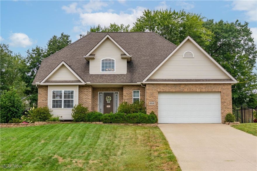 Welcome to this stunning two-story home located in the highly sought-after Mystic Pointe neighborhood within Green Local Schools. The inviting two-story foyer greets you upon entry, opening to a front sitting room and formal dining room. The heart of the home is the open-concept eat-in kitchen, complete with a walk-in pantry, that flows seamlessly into the spacious great room—perfect for everyday living and entertaining. A convenient half bath and first-floor laundry complete the main level. Upstairs, you’ll find four generously sized bedrooms, including a relaxing primary suite designed for comfort and privacy. The lower level remains unfinished, providing endless opportunities to create the space you’ve always envisioned. Step outside to a fully fenced backyard featuring multiple areas for entertaining, whether you’re hosting cookouts, gathering with friends, or simply enjoying a quiet evening at home. Combining space, style, and an unbeatable location, this home is truly a must-see!