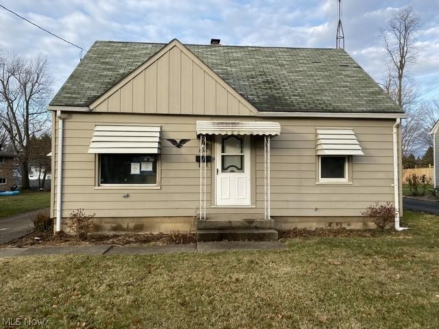 Cozy cape cod with 3 bedrooms, living room, eat in kitchen, 2 baths, full basement and 1 car detached garage.