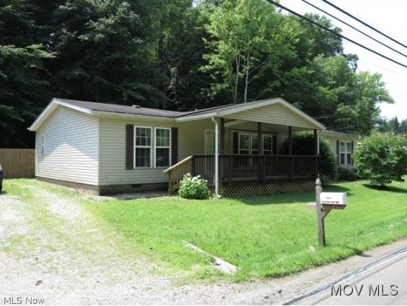 Three bedroom and 2 bath home located just up the road from Lowe's and WalMart. Also very quick and easy access to I-77. House has a large living room that is open to the dining room and the kitchen. This is one floor living without any stairs inside. Small backyard with a patio and a deck and nice privacy. Off street parking for a couple of cars and there are two storage sheds at the end of the driveway. Property is part of an estate and is being sold "as-is". Elem: Phillips Elementary School Elem/Bus: Y JrHigh: Marietta Middle School School JrHigh/Bus: Y High: Marietta High School High/Bus: Y Fire: VOL Police: SHF PossFreeGas: N ;SQFT=Fin L1:1633, Fin Above:1633, Fin Total:1633, Unfin Above:0;PRKG= Off Street