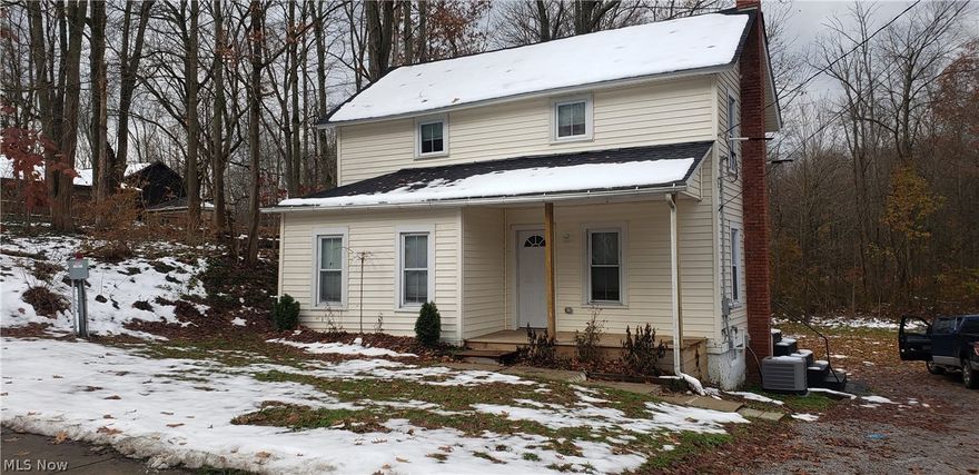 Nicely reconditioned 3 or 4 bedroom home.  Newer everything with nice natural decor.  Total of 3 bedrooms and a first floor master.  Attached 2 car garage. Property is next to the scenic river.   Enjoy the view year round!  Newer furnace, air conditioning and electric throughout.