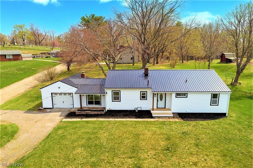 *Exquisite LUXURY Remodeled Ranch In Lake Twp ~ 2100 Sq. Ft, 4 Bedrms, 2 FULL Bathrms & Attached Garage On .45 Acres! *MODERN & Brand NEW W/Out A New Build Price *NEW Metal ROOF *NEW SIDING *NEW Pella Vinyl WINDOWS *NEW CENTRAL AIR *BARN DOORS/SHIPLAP *FINISHED Basement *NEW Premium High End Sencha Optra Stonemart QUARTZ Countertop And Backsplash, Fresh White Shaker Style CABINETS & Pantry W/Black Accent Hardware, SS Sink, Black Commercial Style Faucet W/Sprayer, SS Dishwasher, 5 Burner Gas Stove, Black Cage Jar Pendant Lighting With Matching Dual Flushmount Lights *LUXURY Grey Plank Flooring Throughout! *Grey Walls/White Trim *Living Rm W/SHIPLAP, Black Lighting *Family Rm W/FULLY SHIPLAPPED Walls, Fireplace- Flanked By Sliders To The Front Yard And Back Patio For Entertaining ~ BEAMED Custom Wood Ceiling, Double Black Cage Lights -  *3 Bdrms 1st Floor W/New Carpet *Full Bathrm 1st Floor W/NEW Grey Vanity & Matching Mirror, SHIPLAPPED Walls, New Tub And Surround, Oversized Black Pfist