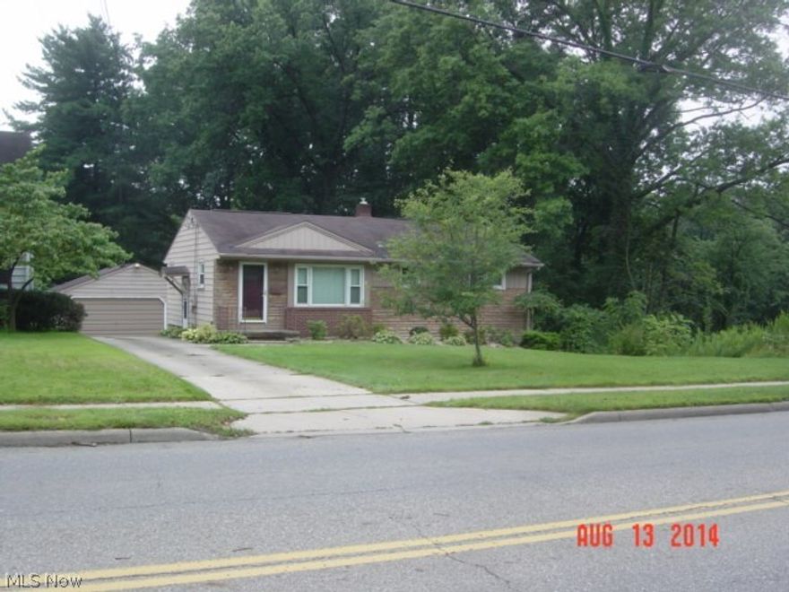 hardwood floors, replacement windows, rec room in basement, walk out to back yard from basement, security system, 24 x 24 detached garage,glass block windows,cheaper then rent....move in condition.