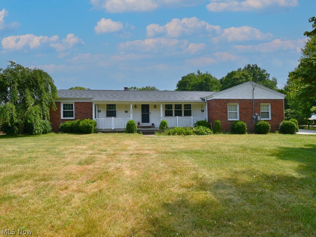 Welcome to your new home sweet home! Nestled on a tranquil .57-acre lot, this charming 3 bedroom, 2 full bath brick ranch offers a perfect blend of comfort and functionality. The heart of the home is the expansive kitchen, boasting abundant cabinet and pantry space, along with a convenient eat-in area. A cozy living room greets you upon entry, offering a warm atmosphere for relaxation. Adjacent, the family room is highlighted by a handsome brick fireplace, creating a cozy focal point during cooler evenings. A slider opens directly to the backyard, seamlessly blending indoor and outdoor living. Additional features include central air for year-round comfort, a 2-car attached garage for convenient parking and storage, and a full basement offering endless possibilities for expansion or storage needs. Outside, enjoy the fresh air from the inviting front porch or relax on the side deck, perfect for enjoying morning coffee or hosting summer gatherings. Enjoy loads of extra storage in the 1 car detached garage. This home combines convenience with peaceful living. Don't miss your chance to make this delightful property your own oasis. Schedule your showing today and envision the endless possibilities this home has to offer! Showings Mon-Fri 6pm-9pm, anytime on weekends.