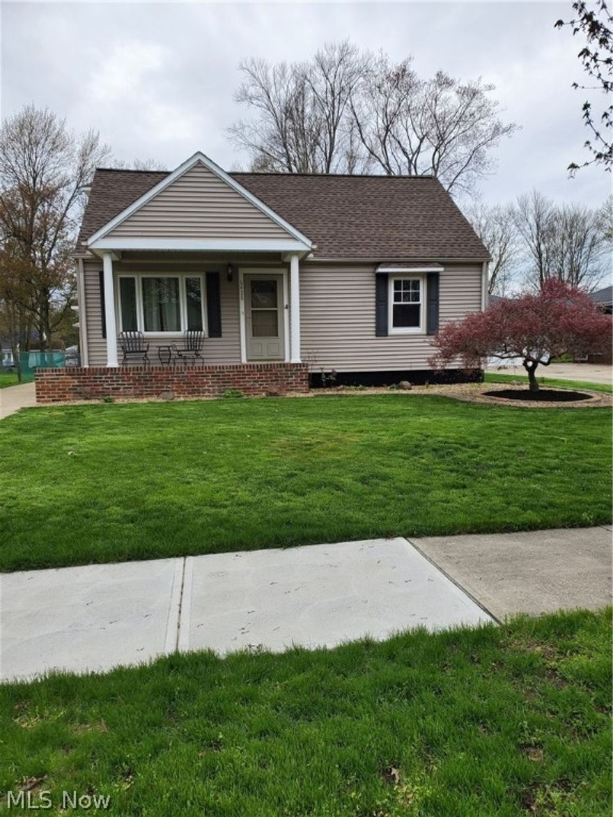 Fabulous Cape Bungalow you have to SEE to appreciate. Enjoy entertaining your family and friends in the charming kitchen that opens to a family/dining combination room. Kitchen features  center island, plenty of cabinets/counters.  Plenty of room in the 20 X 30 upper bedroom with ample storage areas. Hardwood floors throughout. Furnace and central air (2005), Roof (2009), Windows with tilt-in for easy clean (2010), HWT( 2011). Updated electrical panel box 2014. The yard is exceptional with a 214 foot deep lot. Two car garage (22 x 24) has an additional 12 x 17 workshop addition complete with double doors for easy riding mower exit. The
 extended wide driveway make the perfect patio for summer entertaining. New Driveway apron