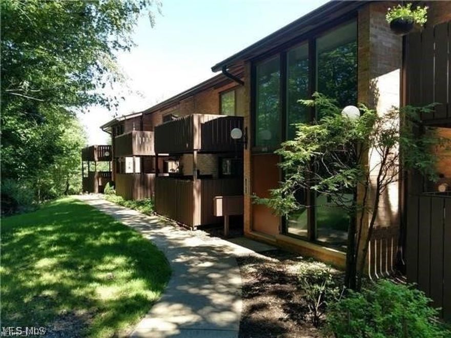 Welcome Home to this 2 bedroom 1 and 1/2 bath Condo overlooking the Woods listen to the Creek and enjoy Mother Nature  !! This condo has 1st floor laundry that includes a washer and dryer ( there on the newer side) . The eat-in kitchen does come with all appliances ( all are approx. 3 years young )  !! The good size living room has a balcony that overlooks the wooded area great for entertaining or just to relax and enjoy the woods and the sound of the creek.... There is a formal dining room as well !! The master bedroom has its own bath and 2 walk-in closets with it own lighting as well as a vanity area and topped off with its own private balcony !!! The second bedroom includes a walking closet with its own lighting as well and dont forget the view you have that too !! There is a full hall bath with shower and tub combo !! There is a 16 x 11 (E-61) storage room, bonus room or what ever you need it for next to the garage on the lower level !! The hot water tank is aprox 4 years old and
