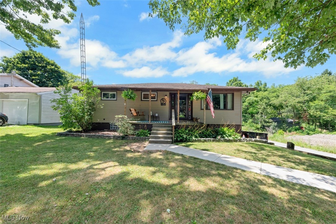 Welcome to 16533 Glenn St, a spacious 4-bedroom, 2-bath ranch-style home in the heart of Glenmoor—just steps from Glenmoor Superette! With 1,760 sq ft of finished living space and a 1,472 sq ft unfinished walk-out basement, this home offers endless potential. The main level features 2 large living areas, separated by a eat-in kitchen featuring a new dishwasher (2024), Wall Oven (2021), touch-less kitchen faucet, and new light fixtures. This home also features 2 full handicap accessible bathrooms both with large walk-in showers. New vinyl flooring throughout the family room, kitchen, hallway, and laundry area, hardwood floors throughout bedrooms and newly scrubbed carpets in the living room and master bedroom. Enjoy modern conveniences like a Nest thermostat, Bluetooth smart speakers in the bathrooms, and a gas fireplace. The walk-out unfinished basement includes a second kitchen, plumbing for an additional half bath, and access to a built-in 1-car garage—perfect for guests, hobbies, or future expansion. Outdoors, relax on the covered front patio or entertain on the spacious back deck. Additional highlights include a second detached garage, updated AC and Furnace (2021)