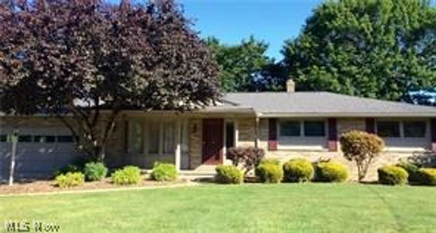 Large updated quality built brick ranch in desirable Louisville location. An  excellent, clean home w/ new carpet, new roof, gutters/sofits, with guarantee to transfer to buyers, newer water heater furnace & air,updated electric box, neutral paint throughout . One floor living w/3 bedrooms, 2.5 baths. This  home has so much to offer. Large rooms, great floor plan for entertaining. Beautiful Great Room w/ cathederal ceiling, beautiful views  from all around with numerous windows! A fantastic lot!  French doors from dinette & great room  lead onto the large deck. Walk through the French doors in the Great Room into an office which also features a separate exterior entrance for your clients if you are in need of a home office! Large kitchen & dining w/ wood flooring.  Newer stainless dishwasher and range/oven. Large laundry room w/washer and dryer included on the first floor. Recreation room and another full bath in the lower level. Glazed tile 2 car garage,Also a shed/workshop built into