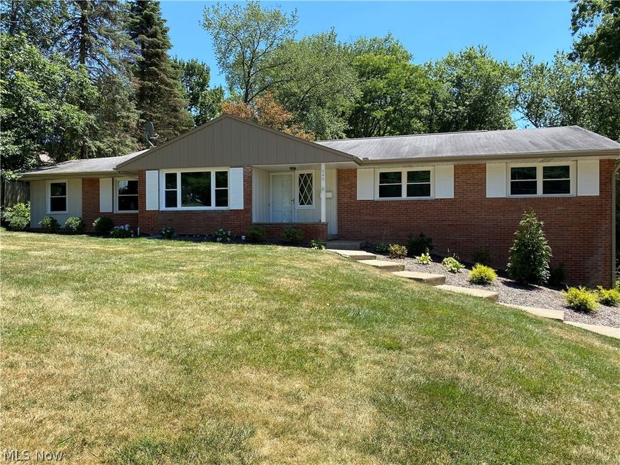 Completely remodeled with 4 bedrooms, 4 living areas and 2 full baths all on the main floor.  Brand new kitchen with granite counters and all 4 stainless steel appliances.  Two brand new full baths also on main floor.  Entire house has been painted with modern colors.  All 4 bedrooms have beautifully refinished hardwood floors and the rest of the house has new tile and carpet.  The basement has a recroom and an additional half bath.  The house has all new AC and windows, all new interior doors and fixtures, new landscaping, updated electric and all new gutters and downspouts. The park like backyard also boasts a large brick patio. House sits on almost 1/2 acre of land.