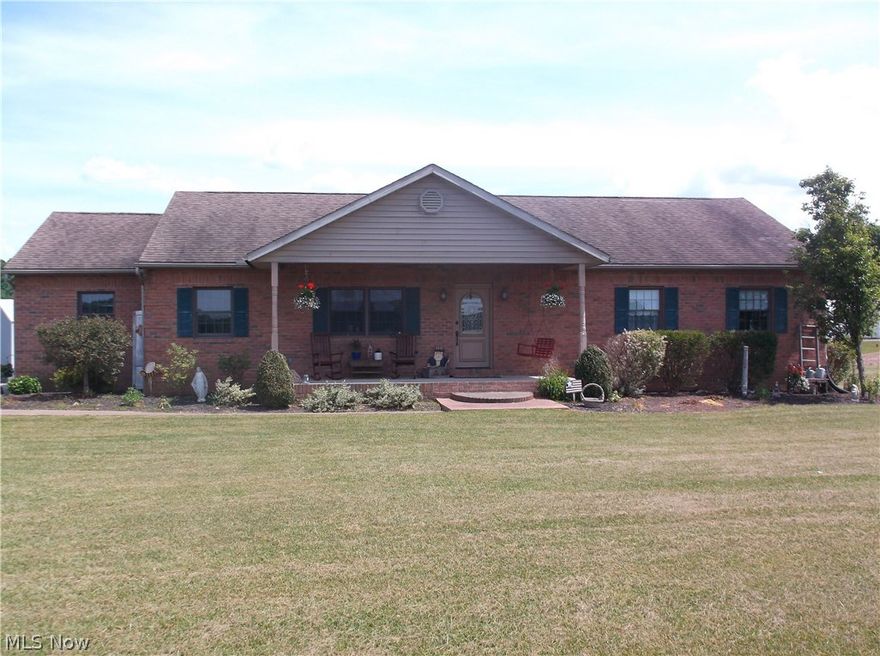 Brick ranch on 1 acre close to Warsaw. Large kitchen and living room, 3 bedrooms, and a partially finished basement. This home has an attached 2 car garage, patio, and an acre of level ground.