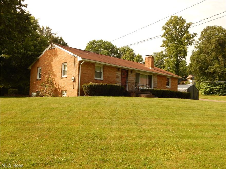 Neat, clean, and maintenance free is this Brick ranch.  Extra parcel # 2617232 Huge large lot w/ area for playground or volley ball court.  approx. 3/4 of an ac. Better hurry on this one!