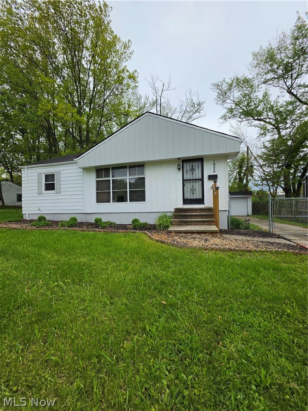 Photo of 1925 Ridgehill Road, Cleveland, OH 44121 (MLS # 5210768)