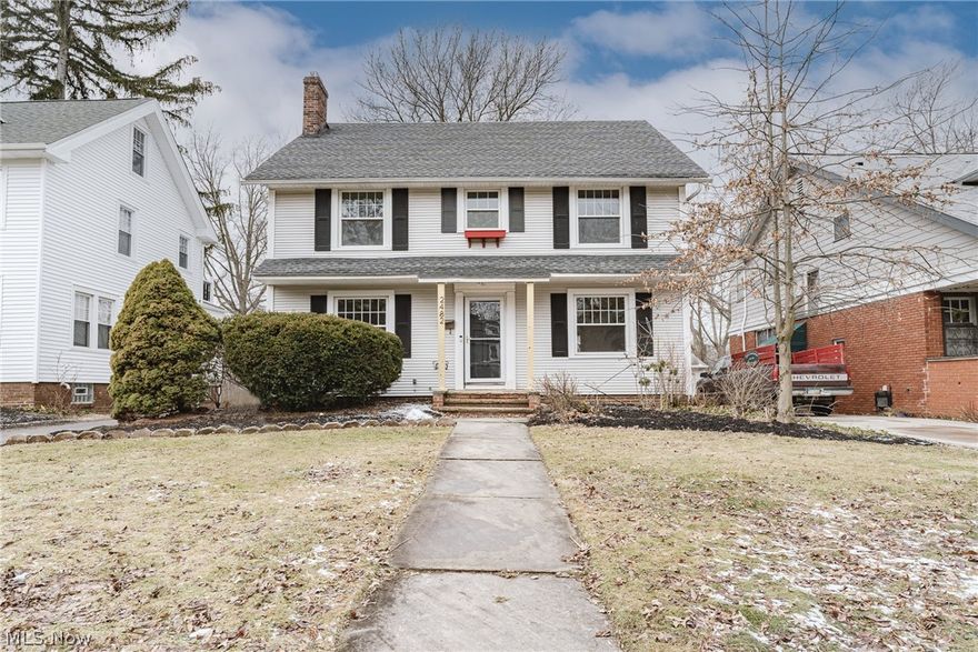 Move right into this classic Cleveland Heights colonial with a perfect mix of original character and modern updates! This charming home offers over 2600 square feet of finished living space with features including an updated kitchen, spacious sun-filled living areas, original hardwood floors, and fresh neutral paint throughout. The front door opens into a vestibule with a french door that opens in the the center hallway. The formal dining room is on your right and the spacious living room is to your left. Here you will a wood-burning fireplace with a lovely ceramic tile surround and large windows that fill the room with light. Head back to the office / sunroom that features built-ins and 2 walls of windows. The kitchen boasts granite countertops, updated appliances, and a cozy eat-in area. A half bathroom and a mudroom by the back door complete the first floor. Upstairs you will find 4 sizable bedrooms with hardwood floors and surprisingly large closets! A nice landing at the top of th