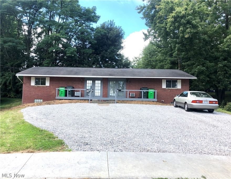 Investors or Owner Occupied buyers take a look!.....Brick Duplex within walking distance of shopping, banks, restaurants and more!  One unit currently vacant and ready for an owner/occupant or tenant of your choice. This unit has fresh paint, flooring and new tiled tub surround, new wall A/C,  and both units have new mulch and driveway limestone with parking for 4+ vehicles. Tenants pay electric/gas/cable. Owner pays water/sewer/trash.  Laundry located in basement, which has been professionally waterproofed. New sidewalk in front of duplex was also recently installed.