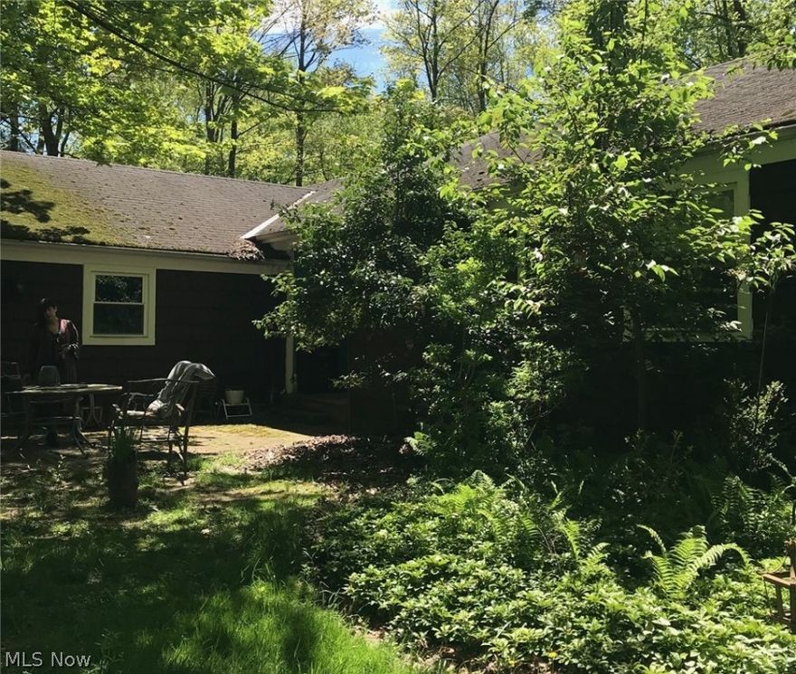 Location! Location! Location!  Value in the land -  Beautiful wooded 1.9 acre lot.  Orange Schools.  House has 3 Bedrooms, 2.5 Baths, and 2 Fireplaces.