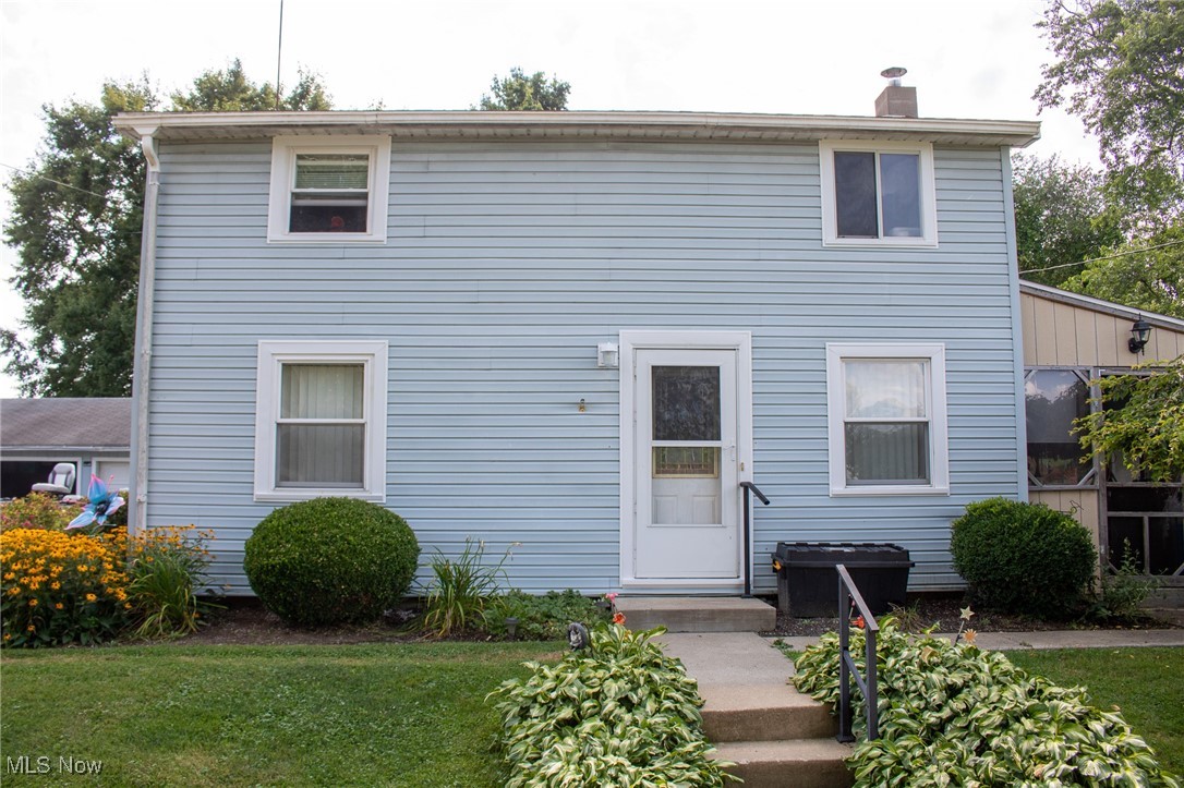 Charming 3-bedroom home on a scenic, level 0.47-acre lot at the end of a quiet dead-end street. One bedroom is a pass-through. Offers 1,382 sq ft of main floor living with city utilities and no zoning restrictions. Cozy living room features a wood-burning stove. Enjoy an enclosed patio, fenced backyard with animal runs, barn/stable, and 3-car garage with lean-to. Kitchen includes gas stove, newer refrigerator, dishwasher, and microwave and pull out shelves on bottom cabinets. Washer and dryer convey. Newer furnace and A/C, 2013 roof with 50-year shingles. Ample storage throughout. A rare blend of comfort, space, and flexibility!