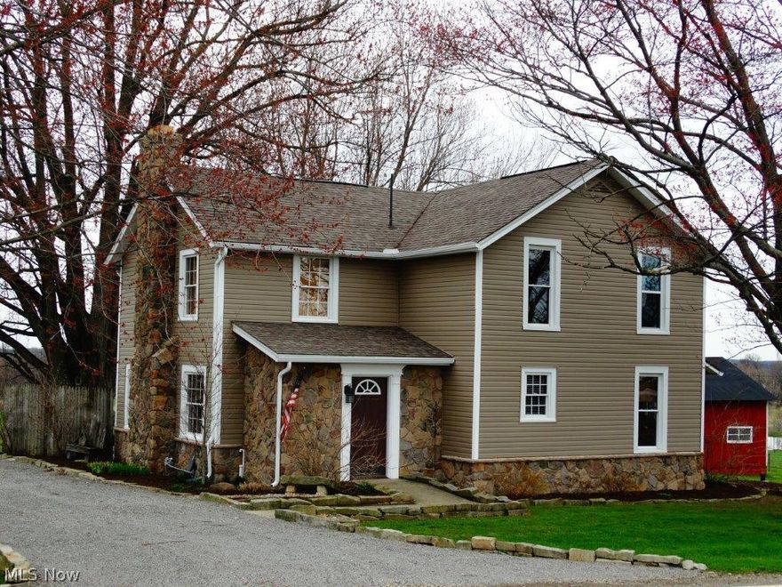 Wonderful setting for this 6 acre property, centrally located between Fredericksburg, Apple Creek, & Mt. Eaton. The home has been remodeled and features large living room with stone fireplace, family room, office or bedroom, full bath, and spacious kitchen on the main floor with laundry. The upstairs has a large master bedroom and 2 additional bedrooms. Full basement with utilities including gas forced air heat, well & septic. There is a nice rear patio and an enclosed front porch. The home has many updates including siding, roof, windows and more! Outbuildings include a large bank barn, 24’x30’ shop, and several smaller sheds. The land has 6 usable acres with fenced pasture, horse corral, and has 520’ of road frontage. Come see for yourself the beautiful features this property offers. Parcel #45-00083.008 located in Salt Creek Township of Wayne County and the Southeast LSD. Taxes per half year are: $1,286.08