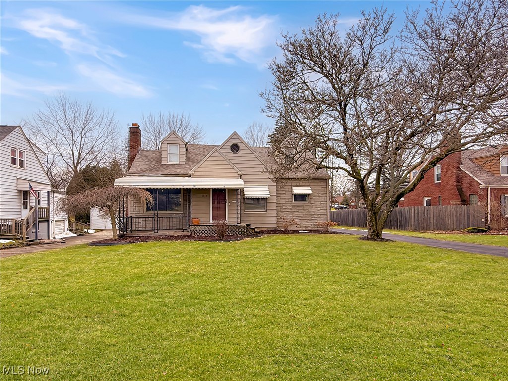 This charming and spacious Cape Cod home, located in the Boardman Local School District, offers an ideal blend of classic appeal and modern updates. Nestled in an established neighborhood, this residence features stone accents, a newer roof, and beautifully manicured landscaping, ensuring low-maintenance living with undeniable curb appeal. A large, covered front porch welcomes you home, complemented by a two-car garage. Inside, abundant natural light flows through newer vinyl windows, highlighting the stunning hardwood floors throughout. The front entryway, complete with a coat closet, opens to a generously sized living room featuring a cozy fireplace. This space seamlessly connects to the open kitchen and dining area, where an updated kitchen boasts sleek Samsung stainless steel appliances. The main floor includes two spacious bedrooms, one with a walk-in closet and the other with double closets, along with a full bathroom. Upstairs, discover the ultimate primary suite or potential in-law suite with an open loft/bonus room, an expansive walk-in closet, a beautifully remodeled full bathroom featuring a subway-tile shower, and a third bedroom. A full, unfinished basement provides ample storage space and endless potential for future living areas. Recent upgrades include a new furnace, central air, hot water tank, electrical systems, washer, and dryer. Don’t miss this opportunity—contact your agent today for more information and to schedule a private tour!