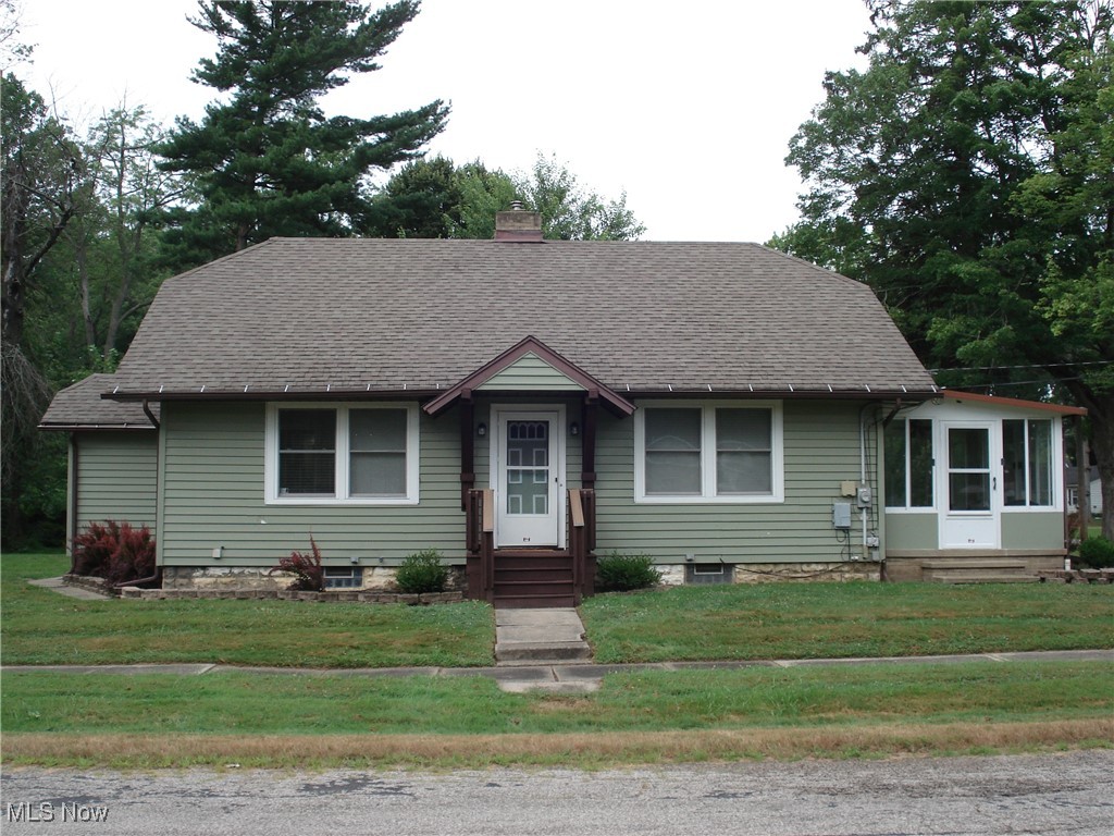 Welcome to this beautifully maintained 3-bedroom bungalow located on a quiet street in the heart of Ashtabula. This inviting home offers a perfect blend of classic charm and modern updates. Step inside to discover a spacious layout with plenty of natural light. First floor bathroom has recently been updated with ceramic tile floor and tiled shower. You'll love the sunroom, an ideal spot to enjoy your morning coffee or unwind at the end of the day. Outside enjoy the rear deck and nice yard ideal for gardening, pets or play. With a convenient location near local schools, shopping, restaurants and Lake Erie!!!!!!