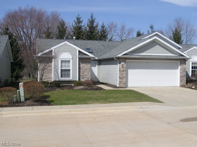 One floor living...no steps. Features a great room w/gas fireplace, 2 skylights, newer carpet (2012) and sliders to a covered patio. Both bedrooms have newer carpet (2014). Nice size master bedroom w/private bath and large walk in closet. Second full bath features a walk-in, sit down tub...easy access. Two car attached garage w/drain and hot/cold water. Eat-in kitchen w/appliances and ample counter space and cabinets. Must see to fully appreciate. No signs permitted.