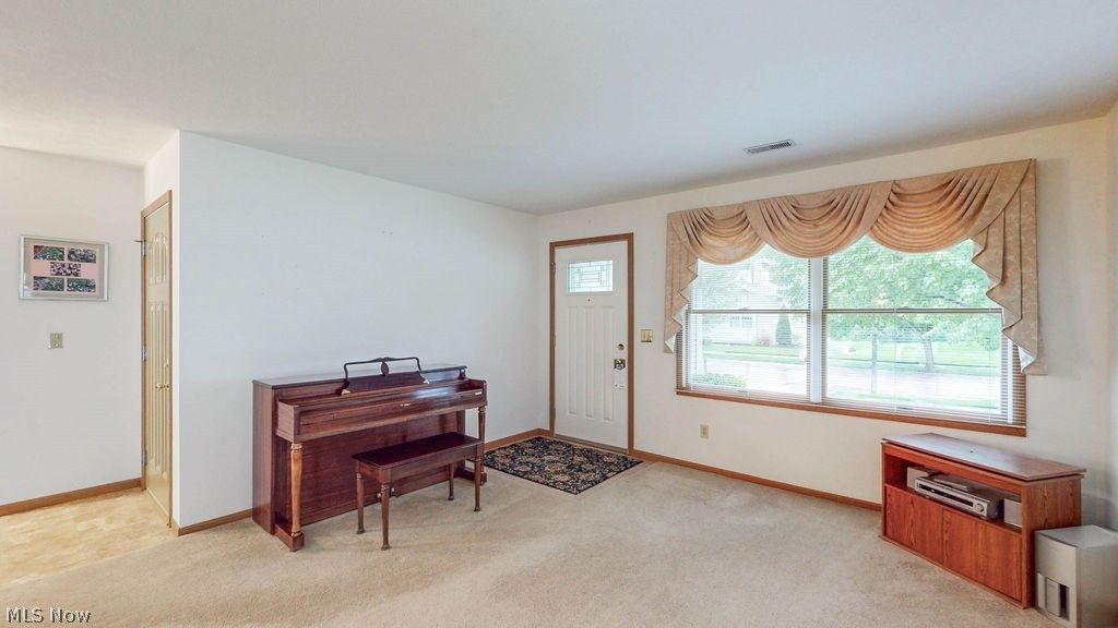 Photo of 249 W Heatherwood Drive, Barberton, OH 44203 (MLS # 5206856)