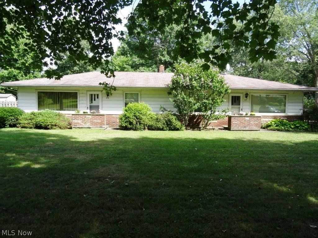 Wonderful turnkey investment property priced to sell now! Fantastic twinplex on a huge scenic lot in Kent. Interior of both units completely repainted (all surfaces) 2016, all NEW carpeting both units 2016, landscaping completed with edging/trimming 2016. Both sides feature private decks, all kitchen appliances AND washer/dryer sets, built-in wall air conditioning units, and one side offers a wood burner as well as forced air heating (both sides). Huge yard with room to spread out, oversized 2 car garage with workshop, and additional storage shed. This rare opportunity offers many potential options - could be great for an investor, owner occupant who would like additional income, or family who needs an in-law suite!