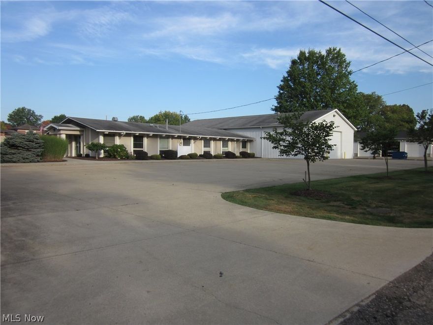 Have a growing business? Need more space? Meticulously maintained, newly painted interior, gorgeous office space with reception area, conference room and 3 bathrooms, 40 x 80 warehouse area for storage or vehicle parking. Located in Ravenna Township.