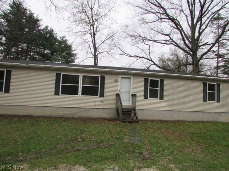 Manufactured home sits on 1.85 acres with 3 bedrooms and 2 full baths. Living room with a wood burning fireplace. Property sold as is. No guarantees. No warranties. Must be pre-approved or show proof of funds.