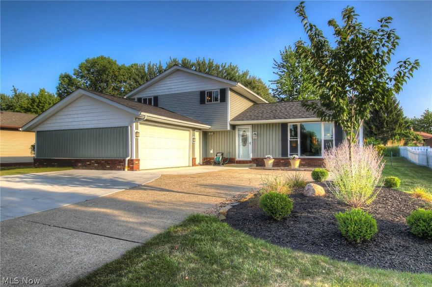 Updates galore here - move right in to this modern 4 bedroom split level! The exterior was extensively re-done in 2015, including roof (tear-off), windows, siding, and gutters, plus it features a turn-around pad (2016) and fresh landscaping. As you step inside the newer exterior doors to the entry way with ceramic tile floors and fresh lighting, you'll find an updated kitchen with breakfast bar and all appliances, and a dining room that flows into the large living room (both with newer flooring). The lower level family room offers modern appeal with beamed ceilings and barn wood accent walls. It walks out to the patio and enclosed back yard. On this level you'll also find an updated half bath and bedroom. Upstairs features three bedrooms and an updated bathroom. Other updates include the A/C (2016), hot water tank (2016) and furnace (less than 10 yrs old). Very convenient location on the border of Strongsville, minutes from Southpark Mall and easy freeway access.