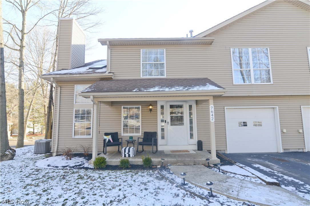 If you are looking for a move in ready, neutral clean and modern condo, look no further! This townhouse style unit boasts beautiful wood floors throughout. Awesome kitchen with updated cabinets quartz counter-tops, hardware, light fixtures and appliances. Cute dinette area for meals. The open 2 story living room is light and airy with beautiful built in shelving unit. First floor laundry room with washer and dryer to stay and modern updated half bath. On the 2nd floor is the spacious master bedroom with hardwood floors, a walk-in closet, and access to the main full 2nd floor bathroom. The 2nd bedroom has hardwood floors and a double closet. The loft gives you extra living space, or a possible 3rd bedroom, and overlooks the living room. Great office or hobby game area option. Large closet in the loft as well. 1 car attached garage is extra deep for additional storage. Covered front porch and back deck off the dinette. Call today and schedule your private showing!