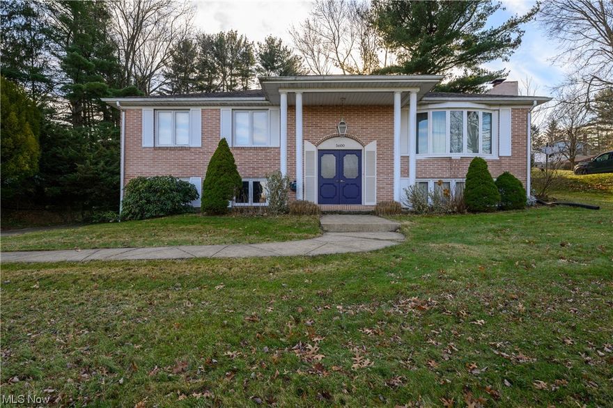 Welcome to 5600 Astrojet, this beautiful brick home is nestled in the classic portivew neighborhood on a dead end street.  The home has been meticulously maintained over the years and is ready for you to make it your own.  Featuring 3 very spacious bedrooms and 2 full baths with a classic color scheme.  There is open sight lines from your oversized living room over looking your dining room and kitchen. Natural light pours through this home creating a feeling of warmth, and making it feel so inviting.  Thru the barn doors there is a large sunroom with park like views you'll never want to leave.   The lower level has an additional living space with a brick fireplace and wet bar, the perfect space for anyone who enjoys entertaining.  You'll love the large backyard that's trimmed in trees giving you a little piece of privacy and serenity. Schedule your showing today if you're looking for city conveniences and to be apart of the charming Jackson Township Community!