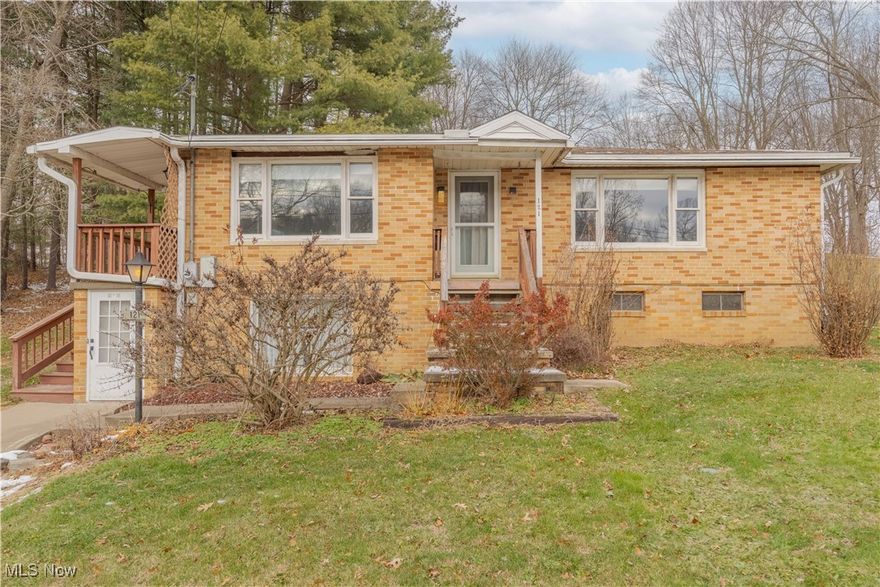 Solid brick home. This country retreat is located 5 minutes from town. The perfect starter home. On the main floor you'll find a full kitchen, living room, 3 bedrooms and a bathroom. Then on the walk-out basement level there is a kitchen, living room, 2 bedrooms and a bathroom. Plus a full laundry room and utility room. Would suit for large families, a guest suite, or possibly a rental with a private entrance. Don't miss out on your chance to transform this diamond in the rough. With this home, the possibilities are endless.