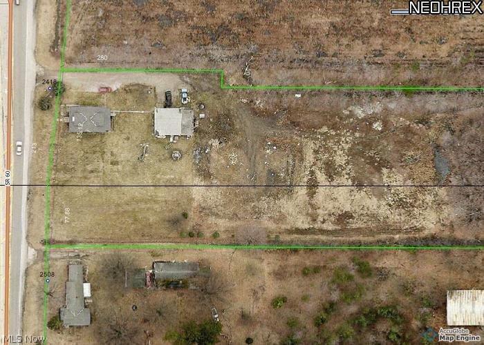 Commercial Land 6.6 Acres, 213 Ft. Frontage Across From Holiday Inn Express. Close To Rt 2 with High Visibility. Home is in fair condition - value is in the commercial land. Home is currently rented and is a 3-bedroom colonial with newer heating system and city water.