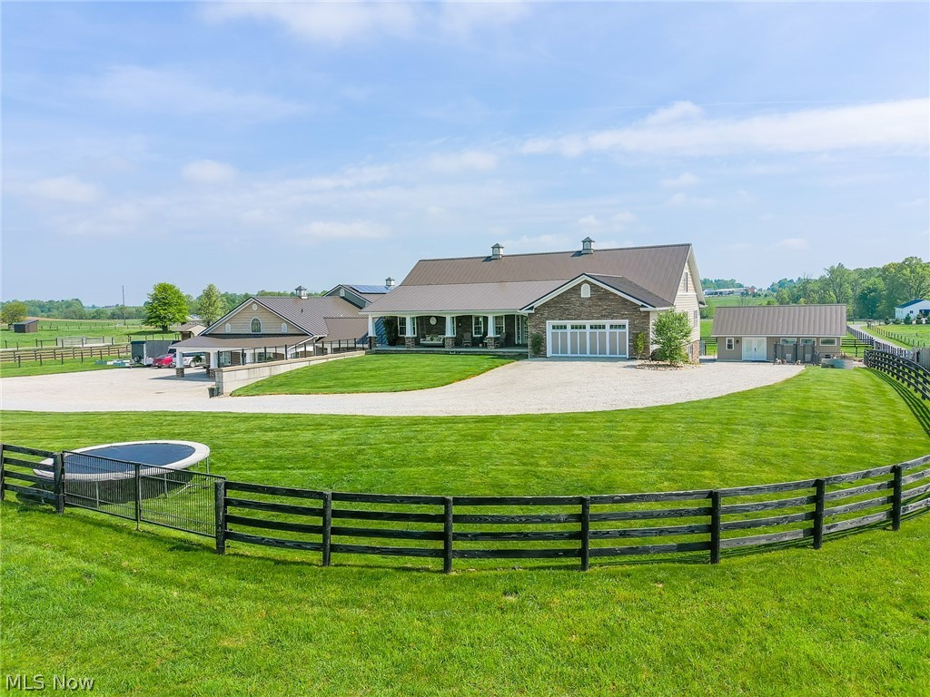 On-site auction Tuesday, June 18th at 6:00 PM. Explore your dream property sprawling across 9.39 acres, situated just outside Kidron and Apple Creek, Ohio. Constructed in 2014, this pristine home boasts 2,240-square-foot and features 4 bedrooms and 2 bathrooms, complemented by a custom kitchen, a flexible second-floor bonus room ripe for conversion into additional bedrooms or a recreational area, and an expansive open basement ideal for storage. The residence is equipped with a state-of-the-art solar system powering both the home and the barn, upgraded with brand-new lithium-ion batteries and a 14,000-watt Kohler generator installed in fall of 2023. Experience ultimate comfort with on-demand in-floor heating throughout the home and the front section of the barn, plus a separate on-demand water heater for the main supply, all fueled by natural gas. Additional amenities include a 40' x 180' horse barn with nine box stalls, a fully insulated 12' x 36' tack room, and a large riding arena. A 16' x 32' nine-run dog kennel equipped with water, electric, and in-floor heating is located just south of the main barn. This remarkable property effortlessly merges your dreams with reality. Contact us today to learn more and mark your calendar for the upcoming auction!