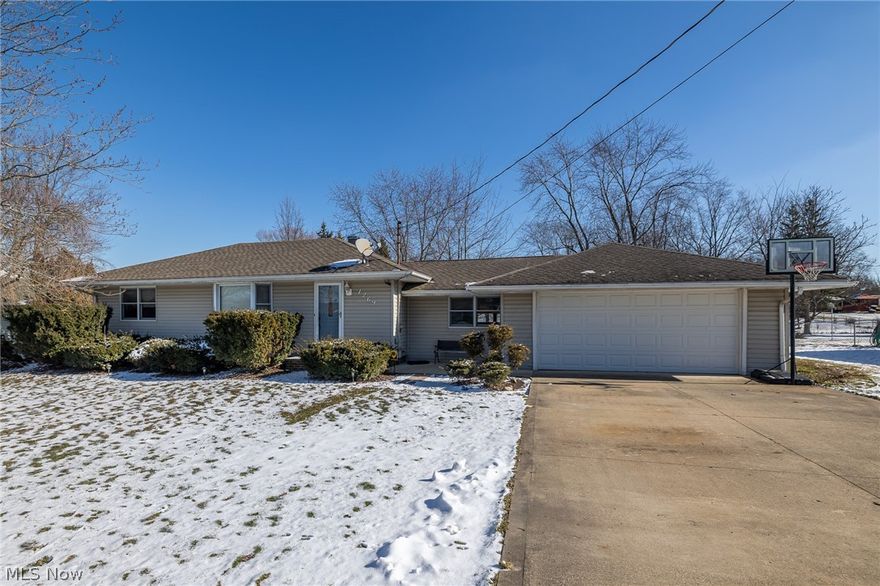 Adorable 3 bedroom Ranch on 1/2 acre with finished rec room in basement * Kitchen was updated with Kraftmaid Oak cabinets and  ceramic flooring approx 10 years ago, all appliances * Family room step down off kitchen with vaulted ceiling * Living room with bay window * Hardwood floors under carpet of living room and one bedroom, the other bedrooms have nice exposed hardwood floors * Updated bath * Basement has finished rec room and extra bonus room, workshop, workbench, additional storage room and laundry area * Fenced yard * Shed * Insulated and heated garage with newer garage door * Attic storage areas from house and garage * Newer double wide driveway * Carpet 4-5 yrs * Garage door 5 yrs * Updated circuit breaker box * Waterproofed 20+ years ago * Furnace 10 yrs * Roof 10 yrs * Vinyl siding * Updated windows * Whole house temperature controlled attic power vent * Extra exterior outlets for Holiday Lights * ONE YEAR HOME WARRANTY * Make an appointment today!