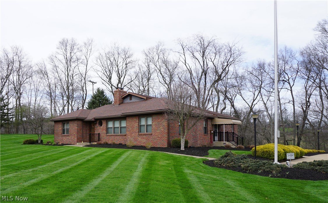 Stellar location at the western edge of Millersburg on 1.79 acres features this Brick Ranch style Commercial office building built in 1951, with an extensive addition added on and remodeled in 1993. There is 2100 sq. ft. finished on the main level with approx. 1000 sq. ft. finished in the lower level. The first floor features 6 private offices, small kitchen/utility area, 1 full bath, 1/2 bath and center meeting area with fireplace. Lower level features a Large Conference room, finished storage area which could be another private office and spacious unfinished storage area which includes the mechanical's for the building. This property would also nicely convert to a residential home or live in part of it and use the rest for your business. Wonderfully maintained property, concrete driveway with a nice sized concrete parking area, well landscaped, a prime location which provides convenience and high visibility, makes this one worth checking out!