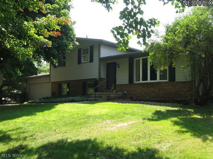 Beautiful treed corner lot with well cared for home in Lake Township. This 4 level Split has so much to offer and many updates. you will love the updated kitchen and the large dining area not to mention the private back patio that extends the length of the house. This home is as neat as a pin and ready for you to move in.