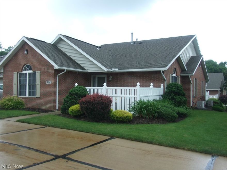 Freshly painted condo available in friendly community of Bayberry Cove. Well maintained, including all new light fixtures.  Located in the North end close to restaurants, clinics, and Health Point.  Move into this cul-de-sac where landscaping and snow removal are done for you!  Two car garage with pull-down storage.  You will love entertaining with this open floor plan!  Great room has cathedral ceilings, sunny windows, ceiling fan, and a gas fireplace!  Leads to breakfast bar and galley kitchen with large pantry, refrigerator, dishwasher, built-in microwave, electric range, and double sink with upgraded faucets and garbage disposal.  Large master suite with remote-controlled overhead light/fan, double sink and shower and spacious walk-in closet.  Second bedroom with cathedral ceilings, windows, large closet and adjacent full bath.  Cozy up to the fireplace at the flip of a switch, or listen to the birds while enjoying the sunshine on your private patio.  This condo has everything you