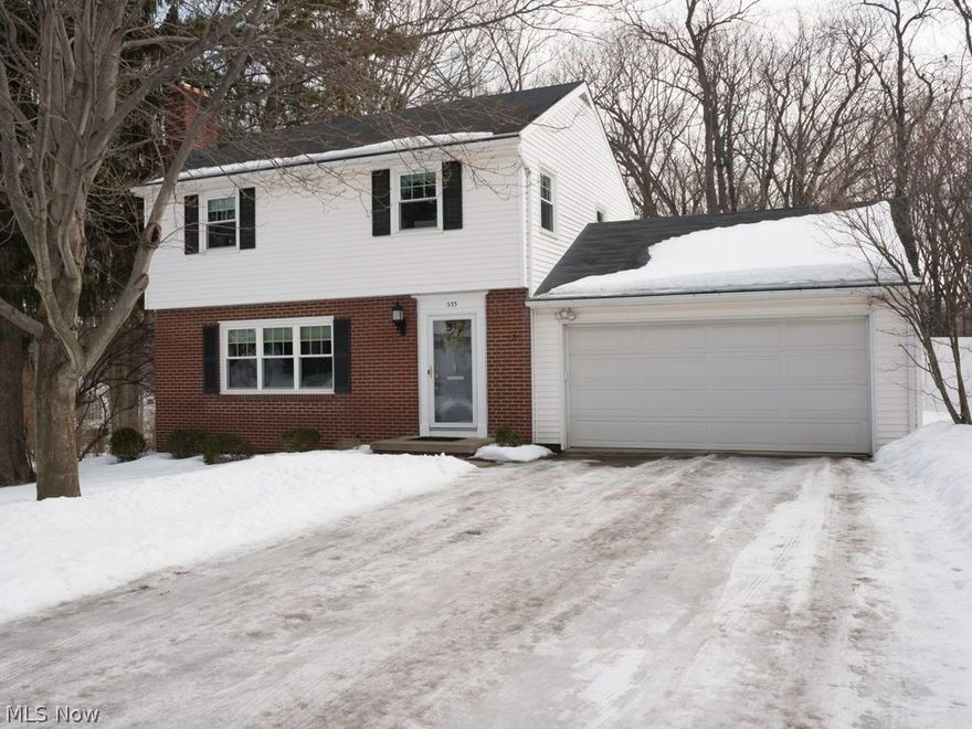 Welcoming Merriman Hills Colonial!  Completely Remodeled 2012 Modern Open White Kitchen with Stainless Steel Appliances, Under Cabinet Lighting, Ceramic Floor, Fireplace, 3 Bedrooms with Hardwood (2 closets per room), Plus 1st Floor Office/Study with Built-Ins, Cedar Lined Closet in Hall, 1 1/2 Baths, Sunroom with Beautiful View of Private Backyard, 2 Car Attached Garage, Workshop/Craft Area, Desirable Large Level Lot with Cherry Trees and View of Wooded Ravine, Updated Mechanicals-Furnace 2009, A/C 2013, Hot Water Tank 2010, Windows 2011.  Home Warranty!