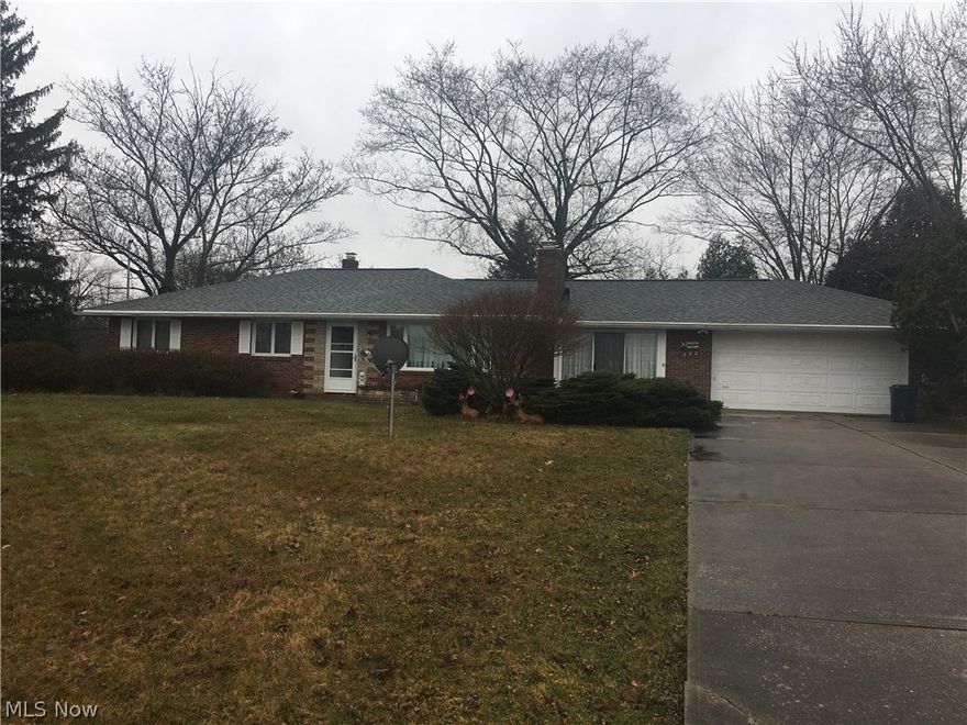 Don't miss out on this very nice brick ranch in the country!  Newer carpet, hardwood floors, wood burning fireplace, whole house generator, newer water treatment, water softener, reverse osmosis systems.  Generous sized bedrooms.  One bedroom is currently converted to first floor laundry.  Can easily be changed back.  Newer chimney flue on top of roof.  Newer roof, electric service, furnace, and A/C.  Spacious eat-in kitchen, and full basement.  The view from your living is super serene.   If you can't handle country living on nearly 1.5 acres, an open field on one side, trees on the other and the beautiful view of the lake across the street, this home is not for you.