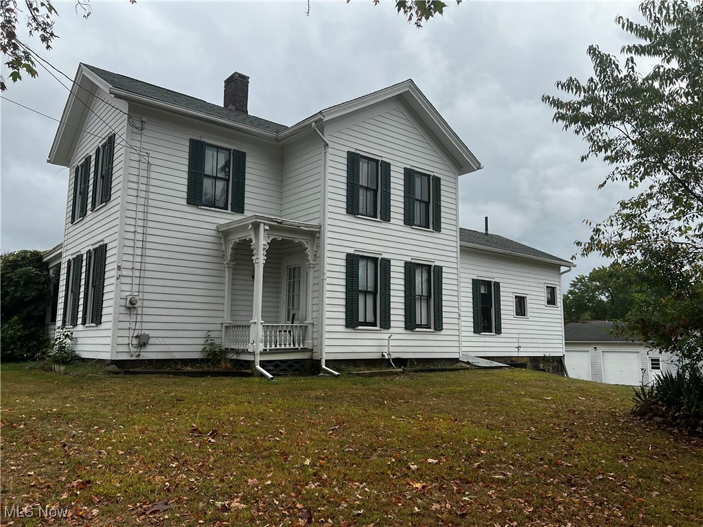 For those that want to remodel and improve. Great potential on this Century 2-Story sandstone foundation and beautiful woodwork and floors. The seperate extra large garage is heated and in great shape. Furnace and hot water tank recently upgraded.