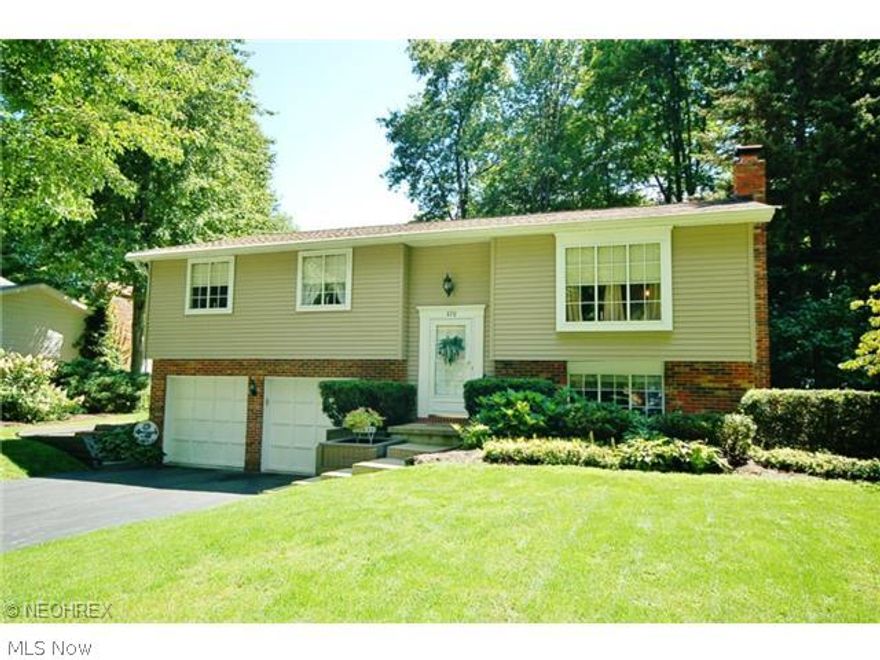 Absolutely perfect! Fantastic location, plenty of room & an amazing back yard. This lovely home has the space & amenities you have been looking for, featuring a fully applianced kitchen w/breakfast bar. The dining room features updated flooring & double doors that lead to a fabulous deck, great for entertaining. 3 large bedrooms are located on the main floor. The master bedroom features a full bath. The lower level has a family room w/brick fireplace, & den or possible 4th bedroom, & half bath. This home has it all...location, condition, & spacious! Newer roof, gutters, vinyl siding, furnace, central air & hot water tank. Wonderful home inside & out!!