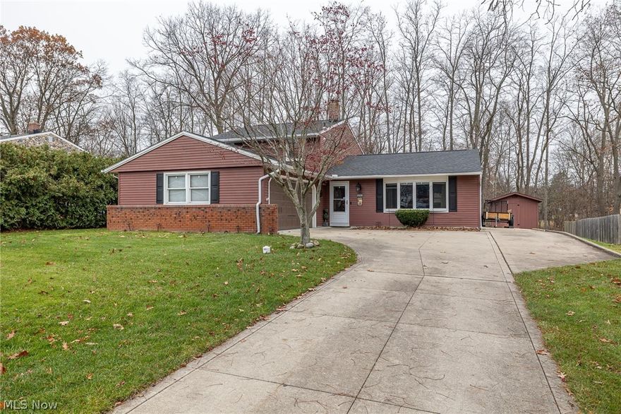 Beautifully updated Split Level * 4 bedrooms * 2 full baths * Backs to the woods * Formal living and dining rooms with hardwood floors, crown molding, bay window and wainscot * Updated kitchen with Maple cabinets, Granite countertops, Stainless steel appliances * 2 full updated baths * Family room with gorgeous brick front wood burning fireplace and hardwood floors * Private wooded lot with deck and 2 storage sheds 10 x12 and 8 x 12 * 2 car side load garage and extra parking pad on side * Furnace and Air 2017 * Hot water tank 2018 * Roof 2018 * Vinyl replacement windows * 10 x 12 shed 2017 * New light fixtures * Garage door 2017 * Sewer line in front yard replaced with clean-out 2017 * Exterior paint 2018 * Gutter sponges 2019 * New plumbing * Wood stove does not stay * Appliances 2-5 years * Bathrooms updated 2018 and 2020 * New interior doors * Must see today!!! PLEASE SUBMIT HIGHEST AND BEST OFFER BY 3PM TUESDAY DEC 7TH