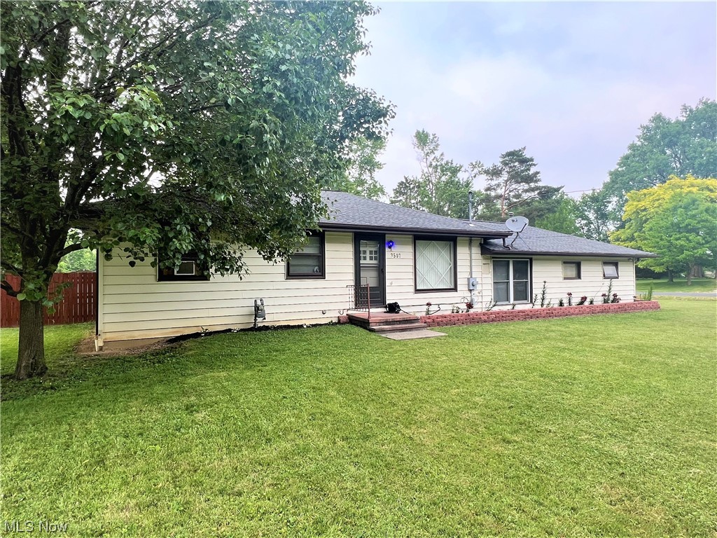 Ranch home on a beautiful half acre corner lot with completely fenced in backyard. Many updates have been completed since owner purchased in 2013 including: Furnace and Hot Water Tank (2013), Stove & Fridge (2013), Fence with large double gated doors (2015), and Roof with 50 year shingles (2016). The Master Bedroom was converted into a large 23 x 10 room. This configuration could be converted back into 2 rooms by buyers if third room is needed. The garage is a nice size with a big max heating element featuring it's own thermastat which was added in 2016. If you need more space, there are 2 rooms that are partially finished in basement. It only needs flooring added to complete your additional living space. Home is being sold as is and won't last.