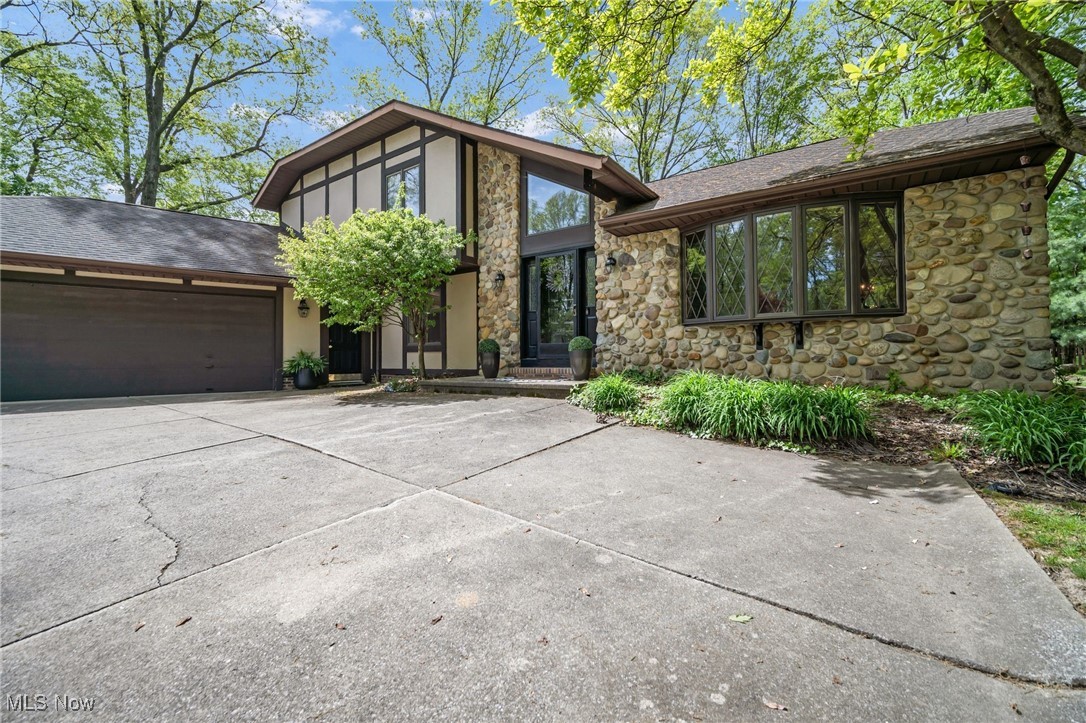 Welcome to this beautifully renovated 4-bedroom, 3-bath home filled with character, comfort, and charm nestled on a park-like wooded lot, ideally located in the heart of Independence, Ohio.
Set on nearly a full acre and offering approximately 2,300 square feet of living space, this home seamlessly blends timeless warmth with thoughtful modern updates.
Step inside to discover a welcoming floor plan with spacious living areas, a cozy fireplace perfect for relaxing evenings, and tasteful renovations throughout that enhance both style and function. Whether you’re hosting gatherings or enjoying quiet moments at home, this space is designed to meet every need. AC Unit installed 2025.
Centrally located just minutes from downtown Cleveland and the airport and within walking distance to the Independence Community Center, local parks, and city amenities!
This home offers the perfect balance of privacy and connection.
Don’t miss your chance to own this move-in-ready gem in one of Northeast Ohio’s most desirable communities.