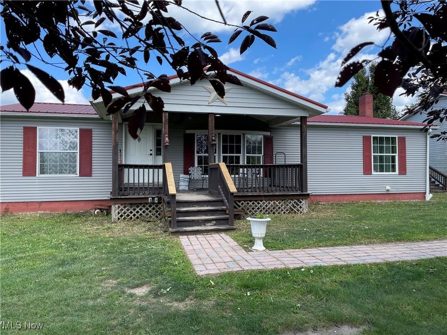 Move right into this 3 Bedroom 3 bath home situated on almost 1.5 Acre.  Large Kitchen/Dining room combination  with a lot of oak cabinets and counter space including and new Refrigerator, Range, and Dishwasher, with a sliding door to a large deck on the rear of the home.  Living room has a large stone fireplace and carpet flooring. All bedroom closets have built in shelves that would eliminate the need for dressers. Full Bath with shower/tub combination between the 2 bedrooms.  Master Bedroom will flt a king size bed. Master bath has a step in shower and large oval sized tub.  The lower level has an additional bath and the entire basement is finished that is a massive family room. The seller has made an area with rough cut logs for the Large T V.  The laundry in the hallway includes the washer and dryer.  The huge 3 car garage has high ceilings to accomadate an R V or boat with a furnace.