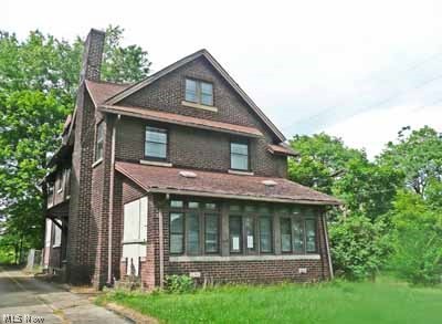 LOCATION:YSU & WICK PARK HISTORIC AREA. ARTS & CRAFTS ARCHITECTURAL DESIGN. AN INVESTMENT OPPORTUNITY? LARGE FAMILY HOME? YOU DECIDE! Full brown brick with a roomy, well proportioned 1950 sqft floor plan. 2.5 story, 4 bedrooms, original wood trims, paneled doors and hardwood floors throughout. This SFR home has an additional 871 sqft which is still workable and located in the unfinished walk in attic, potentially creating 2821 total sqft of living space. FEATURES: original fireplace w/side by side built-ins; original mosaic tile entry; attached 187 sqft brick garage (drive faces Florenecedale); interior glass/panel sidelights w/a glass door which opens to an enclosed 198 sqft first floor porch w/a concrete floor; an additional 104 sqft “summer” porch is on the second floor; 32 sqft concrete patio; 32 sqft stoop; vented glass block basement windows w/concrete inset surrounds. This easy access corner home could become an investment property or your next home. Nicely positioned close to t