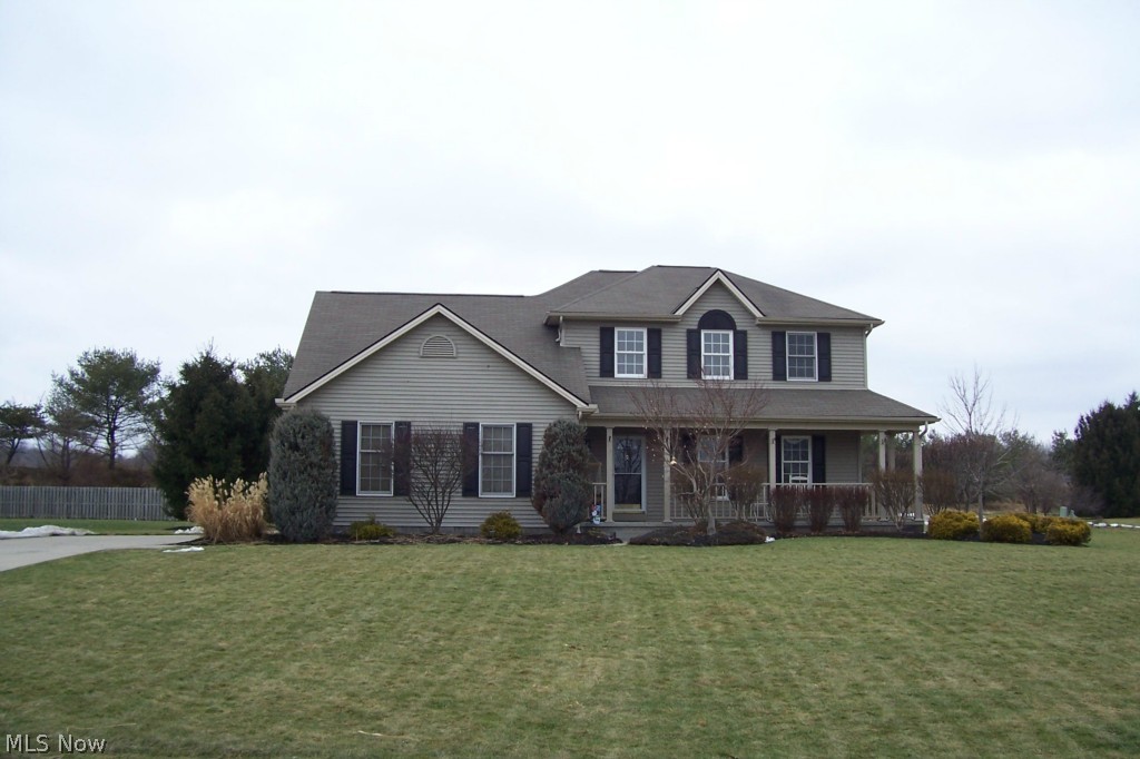 Great neighborhood of Huntington Woods is your new home base. Popular Boardman location conveniently located close to Rt. 11 and the Pa. turnpike, shopping and Mill Creek Park. This four bedroom two-story features an appealing wraparound porch, side entry garage and brick walkway to back patio & shed. Immaculate home with curb appeal sure to get your attention! Neutral living room and formal dining room. Kitchen features medium oak cabinets, backsplash and all appliances. Dinette has french doors leading to bright Sunroom and spacious backyard! Family room with gas fireplace with raised hearth, brick detail and ceiling fan. Master suite features large walk-in closet and private bath. Additional three bedrooms and full bath finish off the second floor. Nicely finished basement is perfect for kids or entertaining with additional laundry area and plenty of storage space. Hot water tank - 2013, sump pump w/battery backup - 2010.