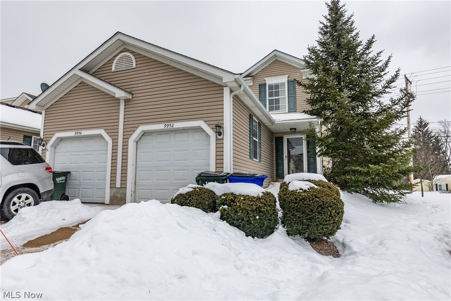 Welcome to this beautiful condo in Streetsboro! The entryway leads down to the open kitchen and living room.  Do not miss the flooring on the first level either! The kitchen has a ton of storage with the beautiful cupboards and overlooks the large living room. The living room has a sliding glass door to allow the natural light to shine in and also boasts a fireplace to keep you warm on these chilly winter nights! Upstairs there are two large bedrooms with lovely carpet. A full basement downstairs that could easily be converted to a rec room. Do not miss out on this one!
