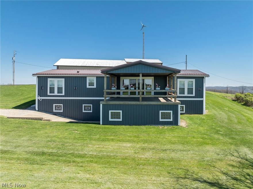 Enjoy breathtaking views from your covered porch at this beautifully renovated home situated on 3.44 acres. This home features a desirable open-concept layout with three spacious bedrooms, two full baths, and convenient main-floor laundry. Extensively updated from top to bottom, the home showcases major improvements including a fully excavated and sealed foundation with French drains, a wall anchor system with a transferable 50-year warranty, and a completely refreshed basement with new plumbing, concrete flooring, updated electrical, and a relocated service panel. Additional upgrades include a high-efficiency furnace, all new ductwork, on-demand electric hot water system, and a Generac 16KW backup generator for peace of mind. The exterior has been thoughtfully enhanced with insulated siding, new windows and doors, two new retaining walls, professional grading and seeding, and a massive 12’ x 56’ treated lumber deck, perfect for entertaining or relaxing while taking in the surrounding landscape. This exceptional property also features two impressive outbuildings. The primary 2,556 sq. ft. garage/shop is perfectly suited for storing a motorhome, boats, or multiple vehicles, and features new polyaspartic flooring, a bathroom, dedicated workshop space, and wind turbine-assisted power, with the turbine connected directly to the garage’s electric meter. Numerous additional updates include upgraded insulation, electrical, and AC, as well as a finished patio addition. The second building offers an additional 1,656 sq. ft. with three bays, providing even more versatility. With a newer metal roof, countless mechanical and structural upgrades, and convenient access to Route 22 and Pittsburgh, this one-of-a-kind property offers the perfect blend of privacy, functionality, and modern comfort. Contact your agent to schedule your private showing today!